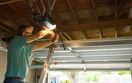 A garage door in need of repair in Naperville, IL